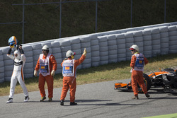 Marshals assist Fernando Alonso, McLaren MCL32, after he parks up with engine troubles