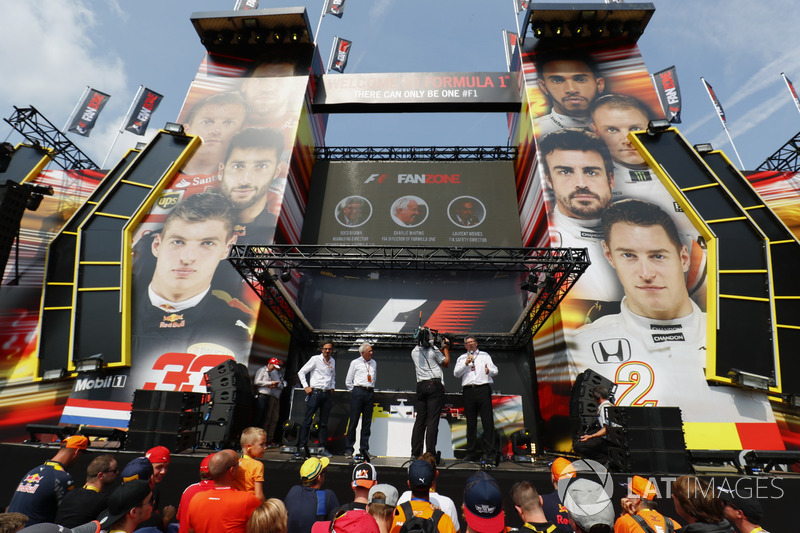 Charlie Whiting, FIA Race Director, Ross Brawn, Managing Director of Motorsports, FOM, on stage in the F1 Fanzone
