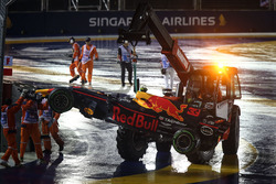 The car of Max Verstappen, Red Bull Racing RB13 is recovered by Marshals after crashing out at the s