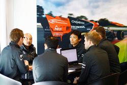 McLaren and Honda team members in discussion