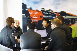 McLaren and Honda team members in discussion