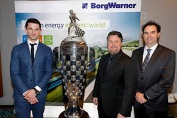 2016 Indy 500 winner Alexander Rossi with the Borg-Warner trophy and team owner Michael Andretti and co-entrant Bryan Herta