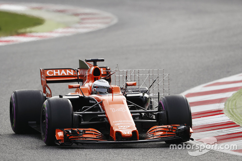 Fernando Alonso, McLaren MCL32, carries sensor equipment