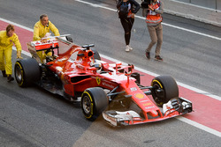 Sebastian Vettel, Ferrari SF70H, stopped in the pitlane