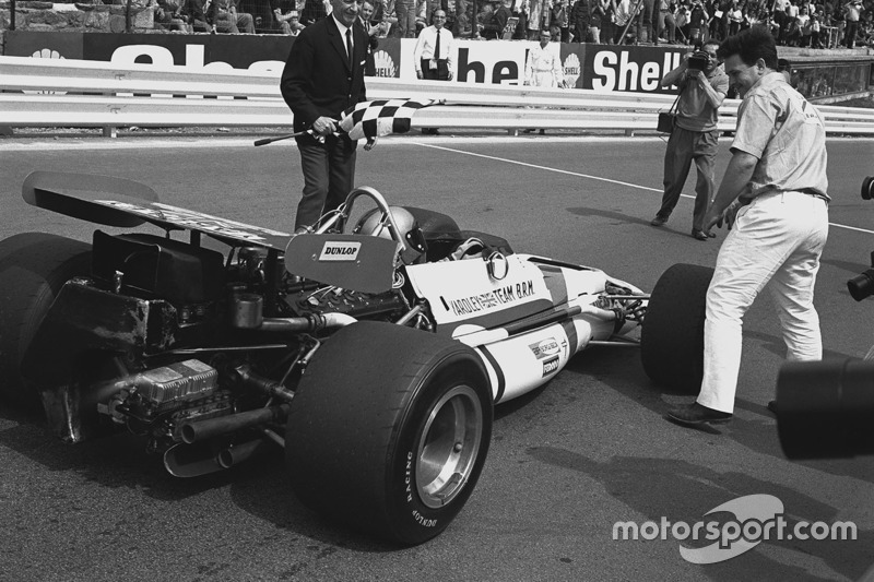 Race winner Pedro Rodriguez, B.R.M. P153, celebrates with team boss, Tim Parnell