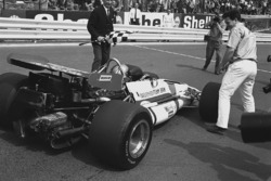 Race winner Pedro Rodriguez, B.R.M. P153, celebrates with team boss, Tim Parnell