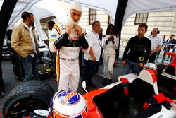 Jenson Button, McLaren, prepares to drive a 2 seat demo car