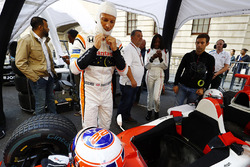 Jenson Button, McLaren, prepares to drive a 2 seat demo car