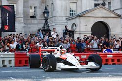 Stoffel Vandoorne, McLaren, demonstrates a 1991 McLaren MP4/6 that was raced by Ayrton Senna