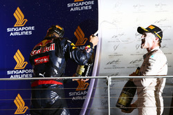 Daniel Ricciardo, Red Bull Racing celebrates his second position on the podium with race winner Nico Rosberg, Mercedes AMG F1