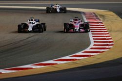 Lance Stroll, Williams FW41 Mercedes, leads Sergio Perez, Force India VJM11 Mercedes, and Sergey Sir