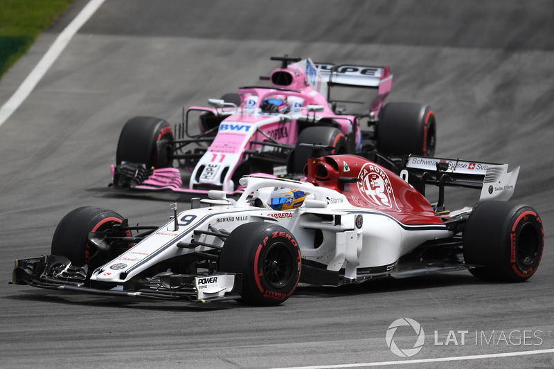Marcus Ericsson, Sauber C37 et Sergio Perez, Force India VJM11