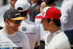Stoffel Vandoorne, McLaren, and Lance Stroll, Williams Racing, on the grid