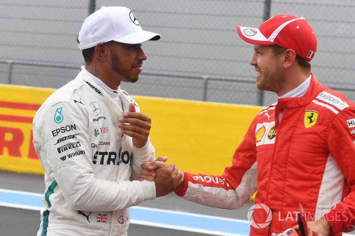 Lewis Hamilton, Mercedes-AMG F1 y Sebastian Vettel, Ferrari 
