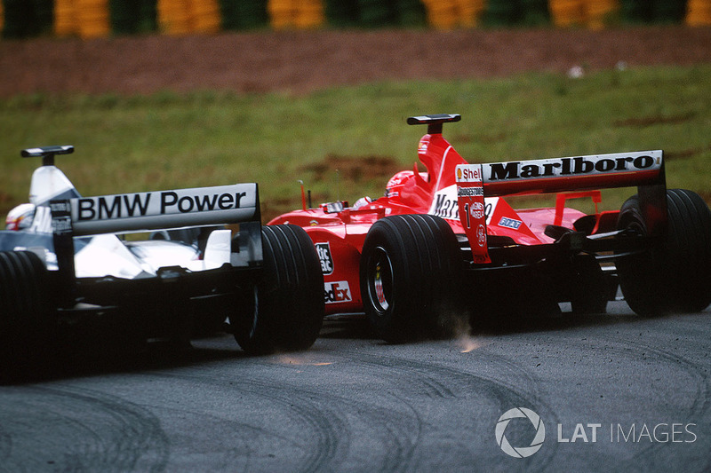 Juan Pablo Montoya, BMW Williams FW23; Michael Schumacher, Ferrari F1 2001