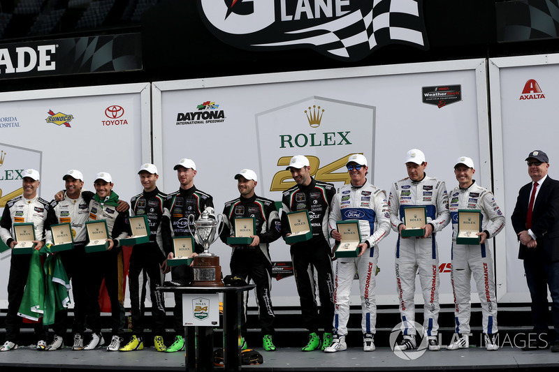 Victory lane all classes: #5 Action Express Racing Cadillac DPi: Joao Barbosa, Filipe Albuquerque, Christian Fittipaldi, #11 GRT Grasser Racing Team Lamborghini Huracan GT3: Rolf Ineichen, Mirko Bortolotti, Franck Perera, Rik Breukers, #66 Ford Performance