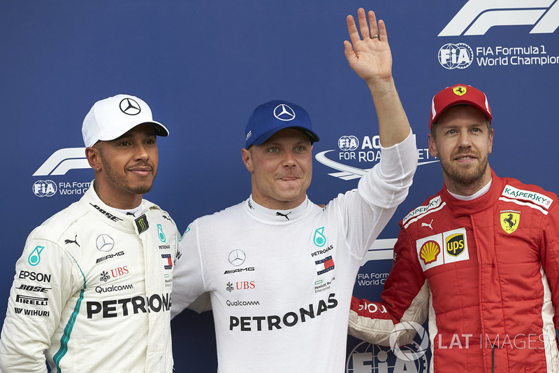 Pole sitter Valtteri Bottas, Mercedes AMG F1, second place Lewis Hamilton, Mercedes AMG F1, third place Sebastian Vettel, Ferrari