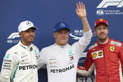 Pole sitter Valtteri Bottas, Mercedes AMG F1, second place Lewis Hamilton, Mercedes AMG F1, third place Sebastian Vettel, Ferrari