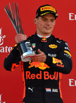 Max Verstappen, Red Bull Racing celebrates on the podium with the trophy
