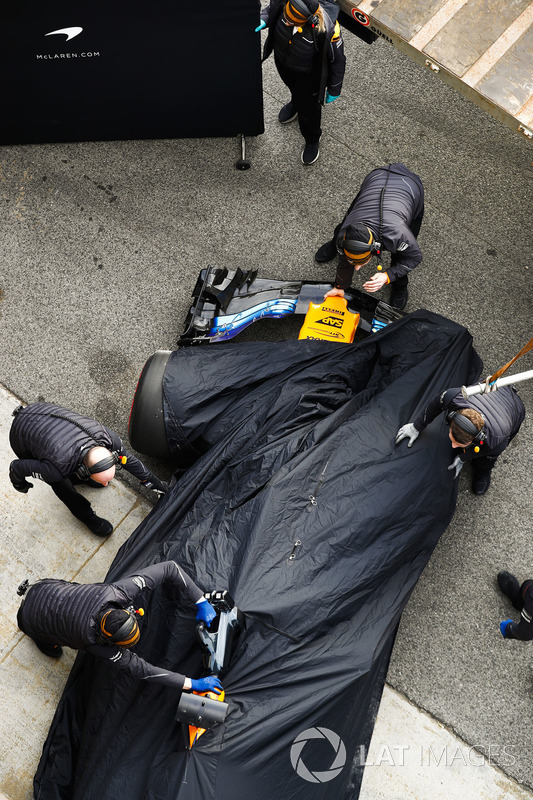 The McLaren MCL33 of Fernando Alonso is returned to the pits