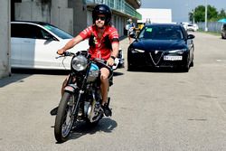 Sebastian Vettel, Ferrari on his Triumph motorbike