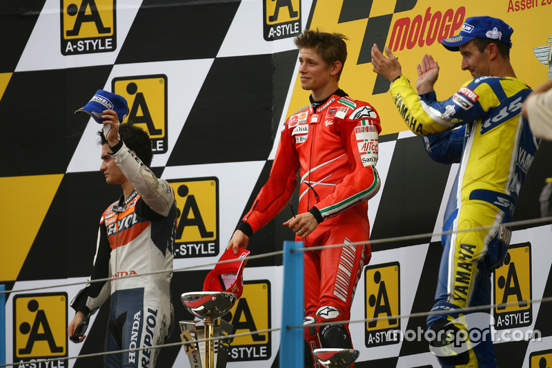 Podio: 1º Casey Stoner, 2º Dani Pedrosa, 3º Colin Edwards