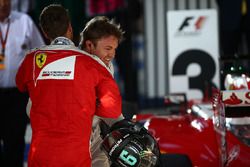 Third place Sebastian Vettel, Ferrari and winner Nico Rosberg, Mercedes AMG F1 Team in parc ferme