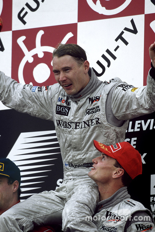 Podium:  David Coulthard and Mika Hakkinen celebrate