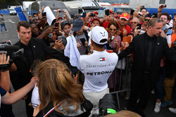 Lewis Hamilton, Mercedes-AMG F1 signs autographs for the fans