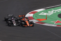 Fernando Alonso, McLaren MCL32 and Romain Grosjean, Haas F1 Team VF-17 battle