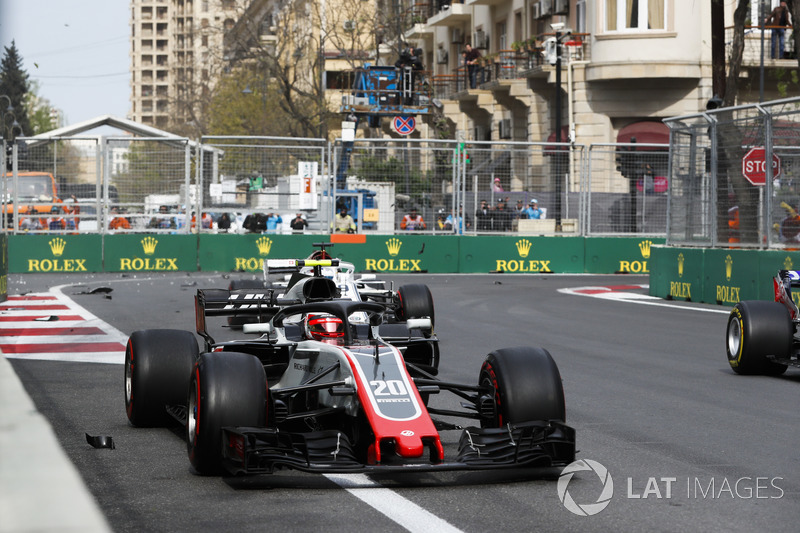 Kevin Magnussen, Haas F1 Team VF-18 Ferrari, Marcus Ericsson, Sauber C37 Ferrari