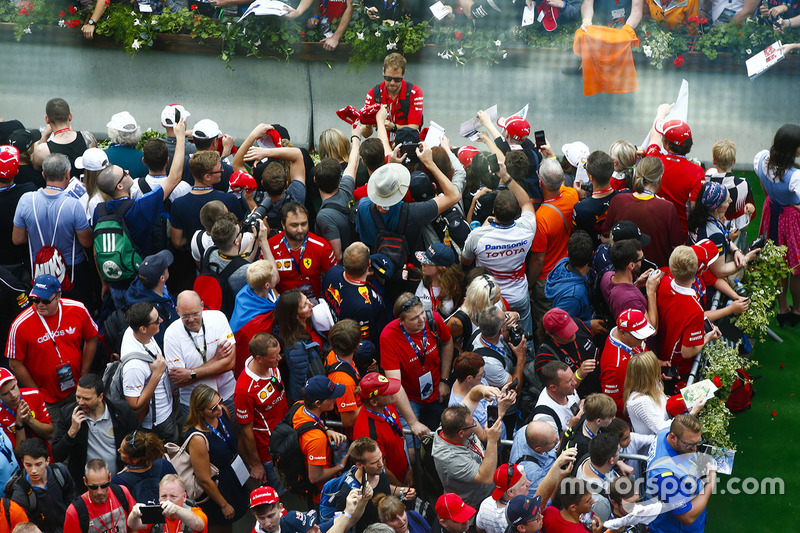 Sebastian Vettel, Ferrari, signs autographs for fans