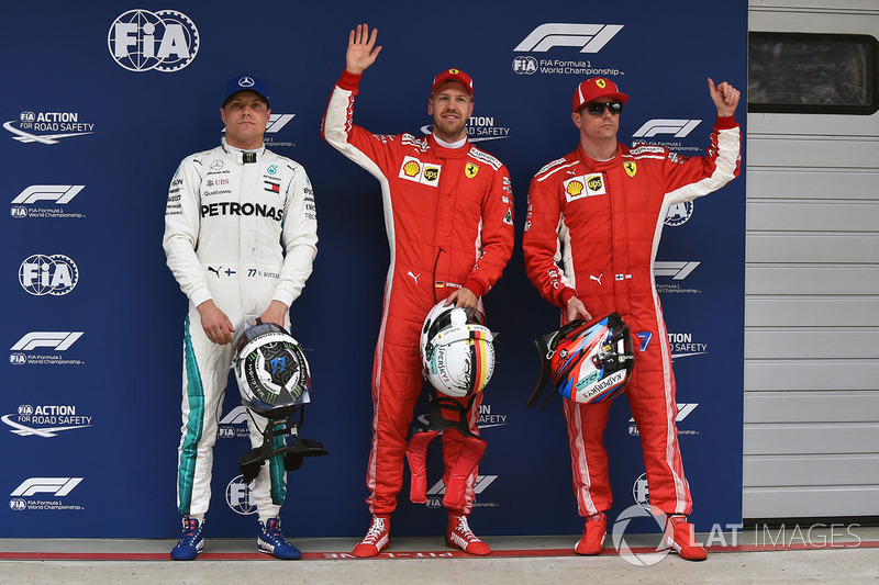 Tiga besar kualifikasi: Sebastian Vettel, Ferrari, Kimi Raikkonen, Ferrari, Valtteri Bottas, Mercedes AMG F1