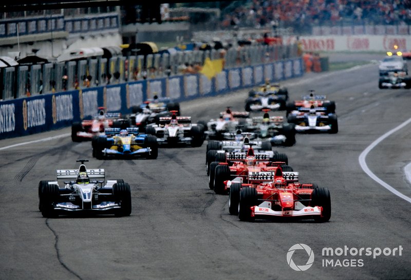 Ralf Schumacher, BMW Williams FW25, Michael Schumacher, Ferrari F2002, se battent pour la tête de course