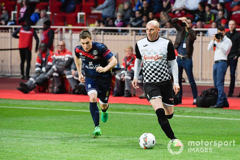 Players on the pitch plays football