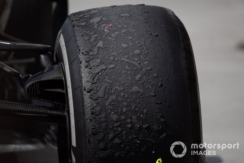 Worn tyre on the car of Lewis Hamilton, Mercedes AMG F1 W10, 1st position, after the race