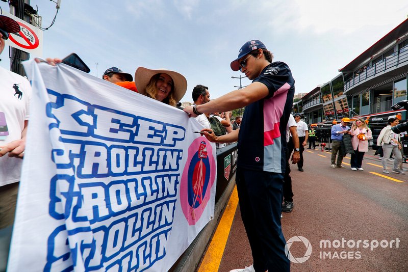 Lance Stroll, Racing Point signs a autograph for a fan