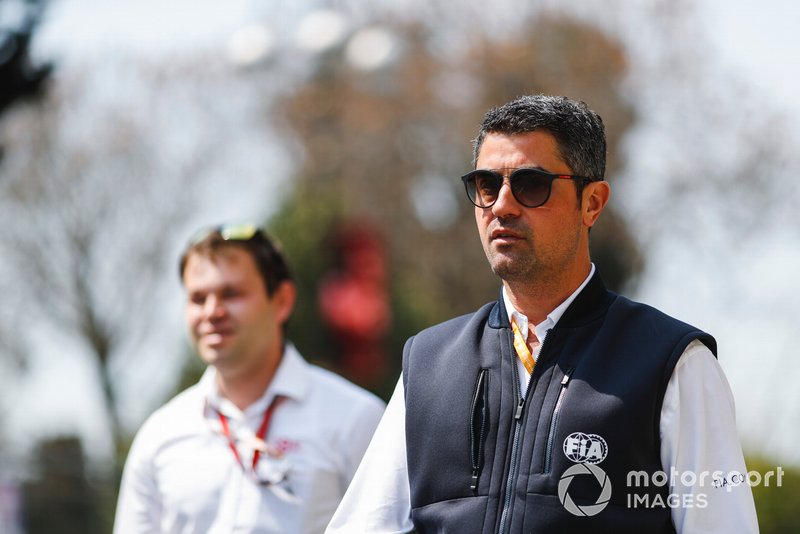 FIA Officials walking the track