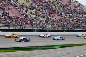 Aric Almirola, Stewart-Haas Racing, Ford Mustang Smithfield / Meijer, Joey Logano, Team Penske, Ford Mustang Shell Pennzoil, Denny Hamlin, Joe Gibbs Racing, Toyota Camry FedEx Freight, and Kevin Harvick, Stewart-Haas Racing, Ford Mustang Busch Light on a pace lap