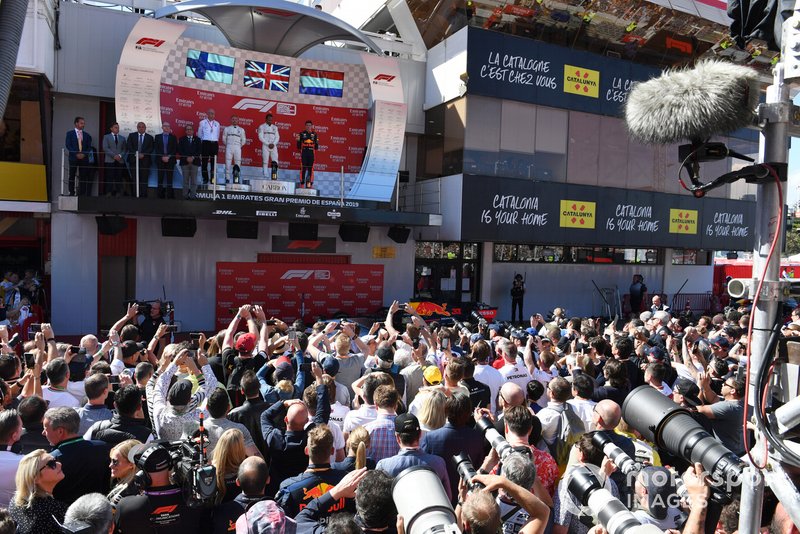 Dr Dieter Zetsche, CEO, Mercedes Benz Valtteri Bottas, Mercedes AMG F1, 2nd position, Lewis Hamilton, Mercedes AMG F1, 1st position, and Max Verstappen, Red Bull Racing, 3rd position, on the podium