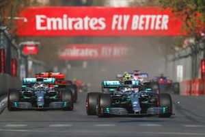 Valtteri Bottas, Mercedes AMG W10 and Lewis Hamilton, Mercedes AMG F1 W10 battle on lap1 