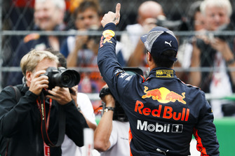 Pole man Daniel Ricciardo, Red Bull Racing, celebrates on the grid after Qualifying