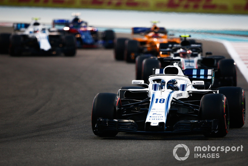 <b>Lance Stroll</b>, Williams FW41 leads Kevin Magnussen, Haas F1 ...