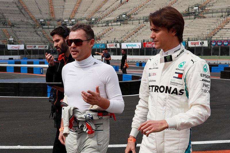 Tom Kristensen and Esteban Gutierrez walk the track