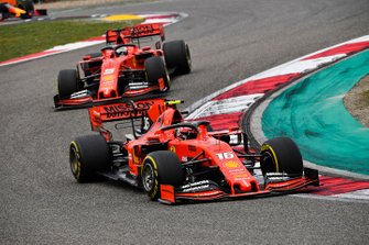 Charles Leclerc, Ferrari SF90, leads Sebastian Vettel, Ferrari SF90
