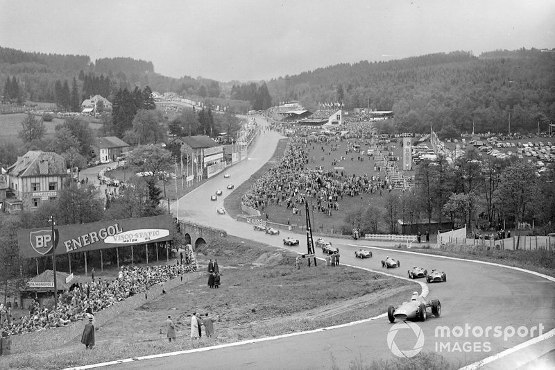 Stirling Moss, Maserati 250F, leads