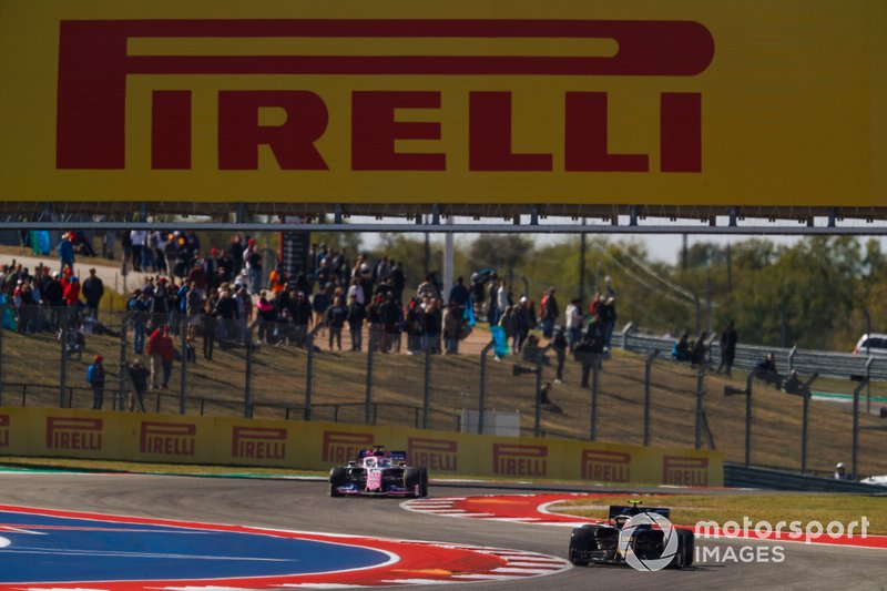 Kevin Magnussen, Haas F1 Team VF-19, leads Sergio Perez, Racing Point RP19