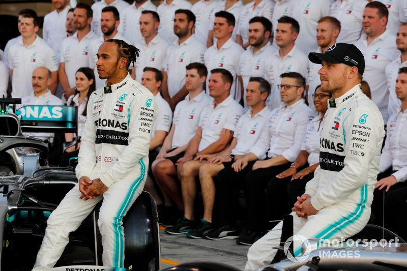 Lewis Hamilton, Mercedes AMG F1, poses for a group photo alongside Valtteri Bottas, Mercedes AMG F1