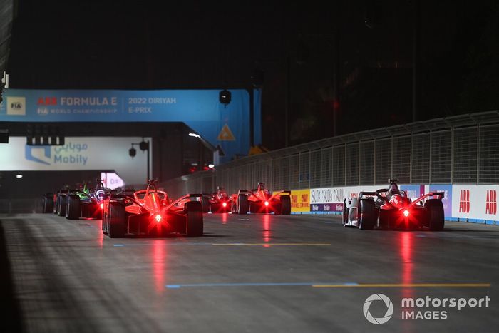 The cars line up for a practice start