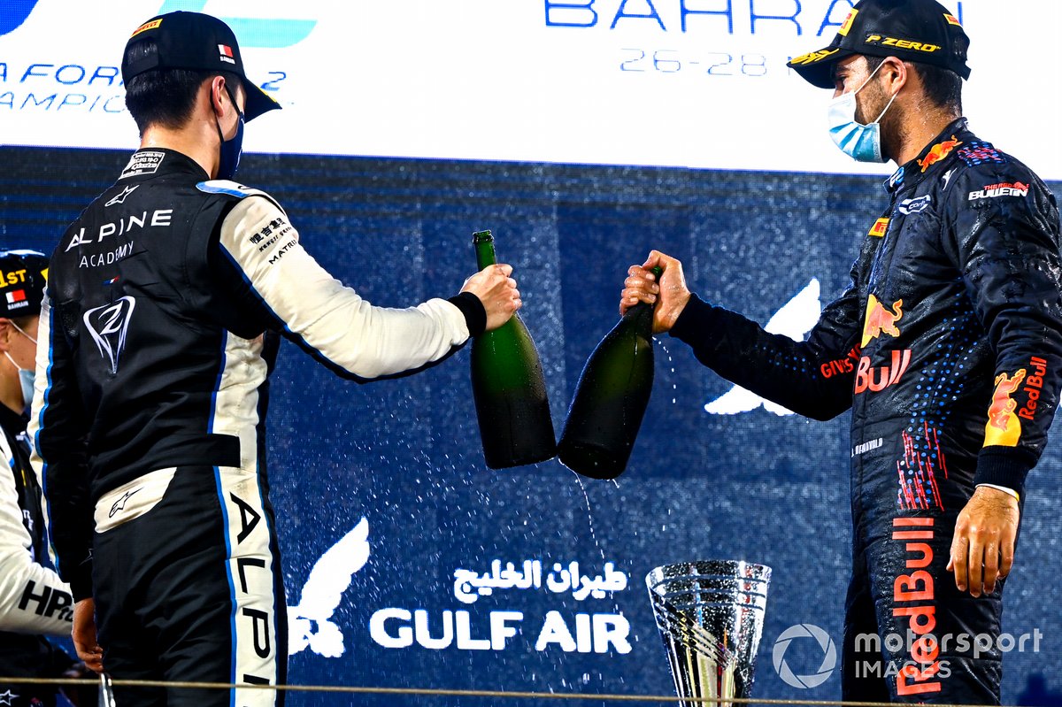 Guanyu Zhou, Uni-Virtuosi Racing, 2nd position, Oscar Piastri, Prema Racing, 1st position, and Jehan Daruvala, Carlin, 3rd position, celebrate on the podium